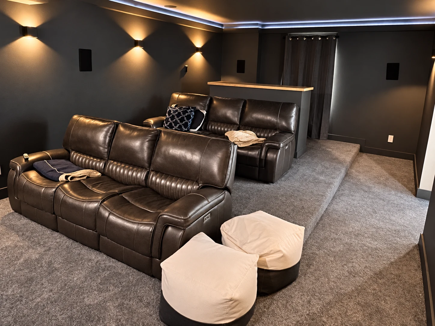 Finished basement home theater with tiered seating