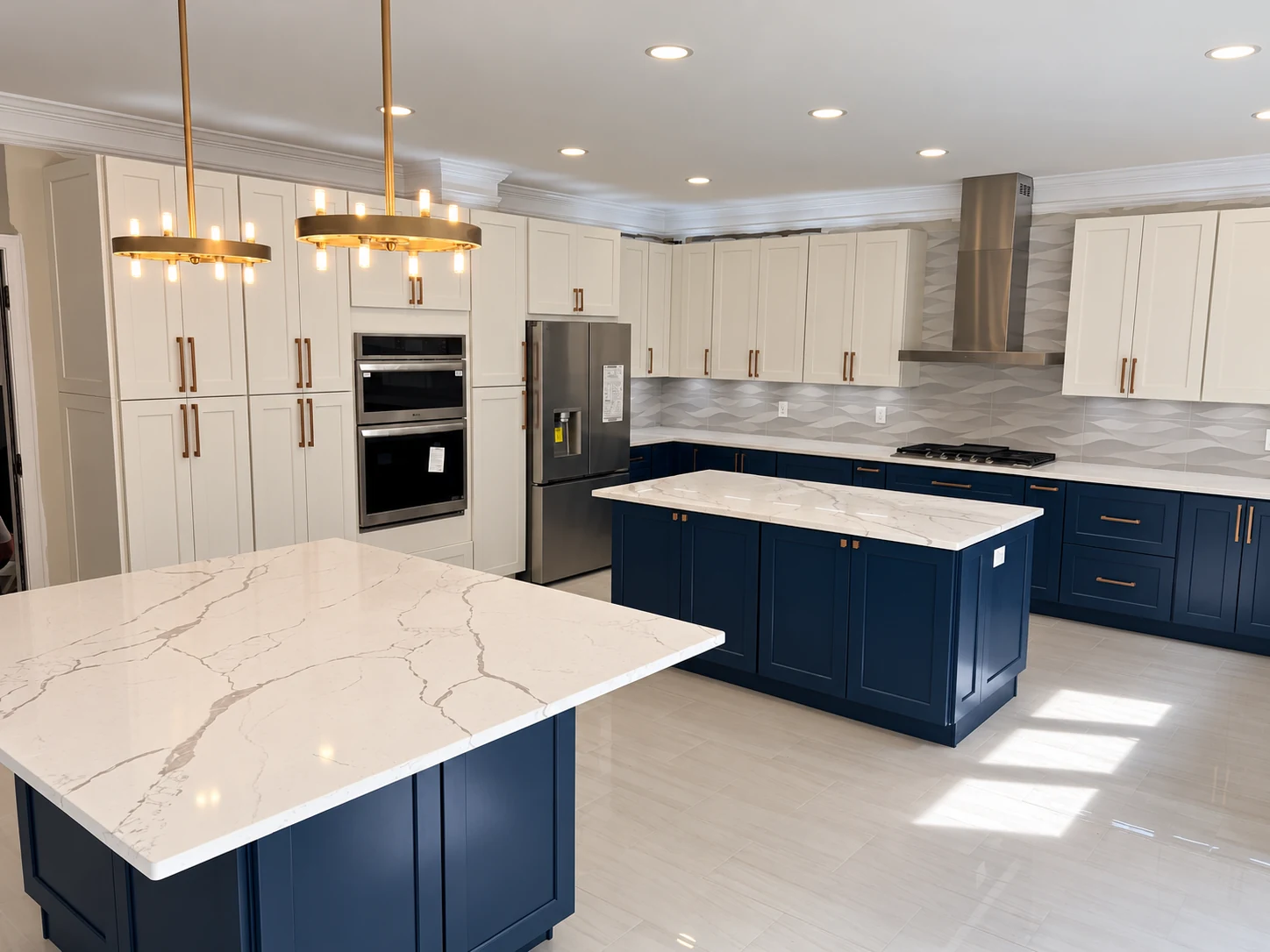 Finished kitchen renovation with two islands and custom cabinetry